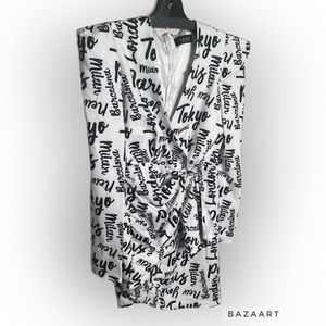 Long sleeve fitted mini dress.